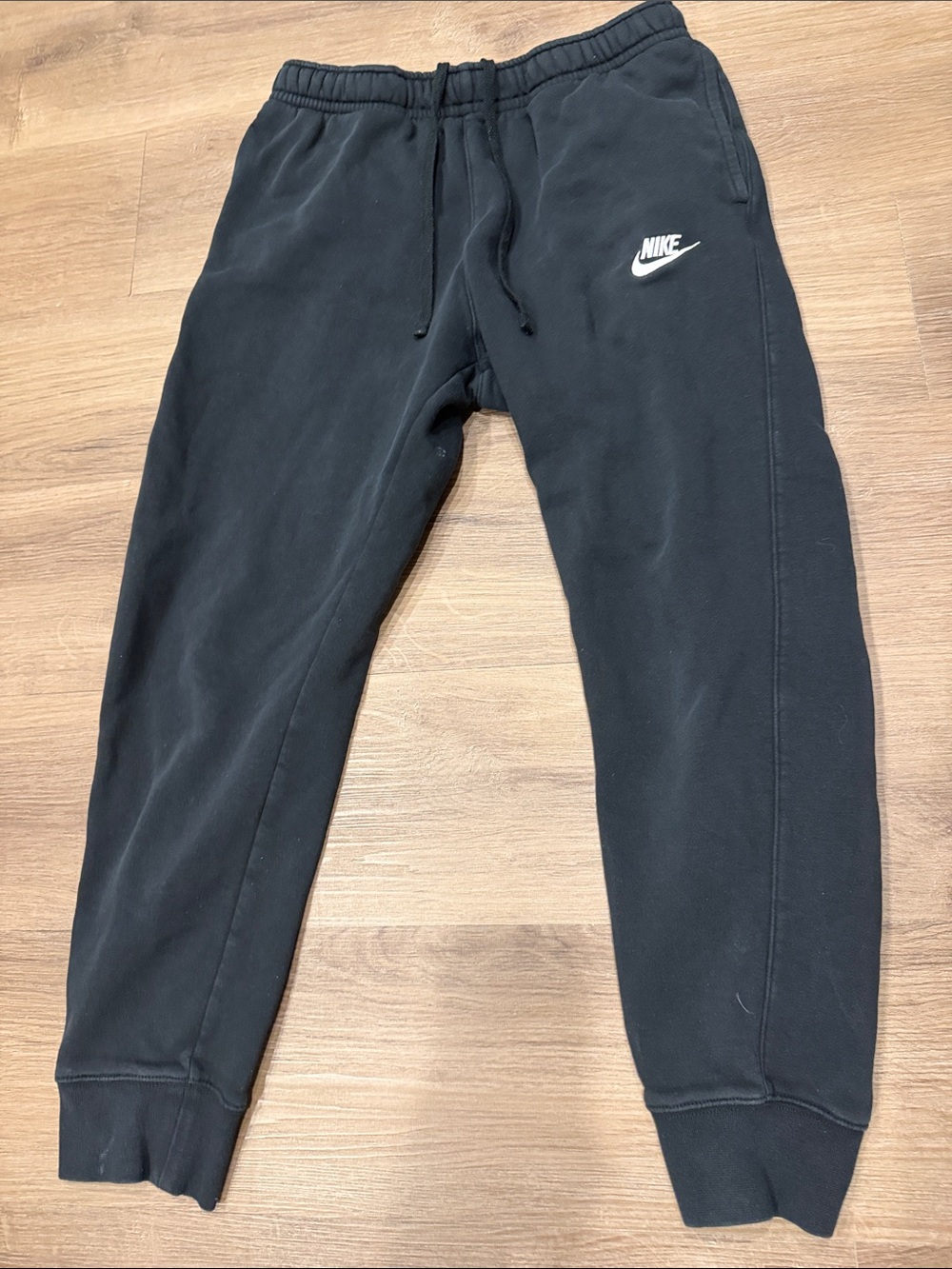 Nike men’s Black Jogger Sweatpants with White Logo